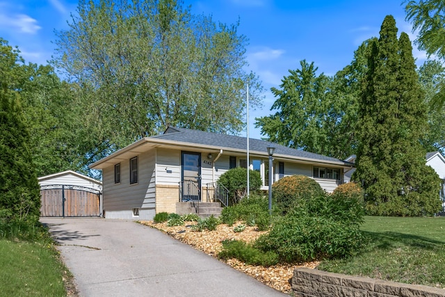 4342 Arthur St NE, Columbia Heights, MN 55421 - view of front of property with a gate and a front yard