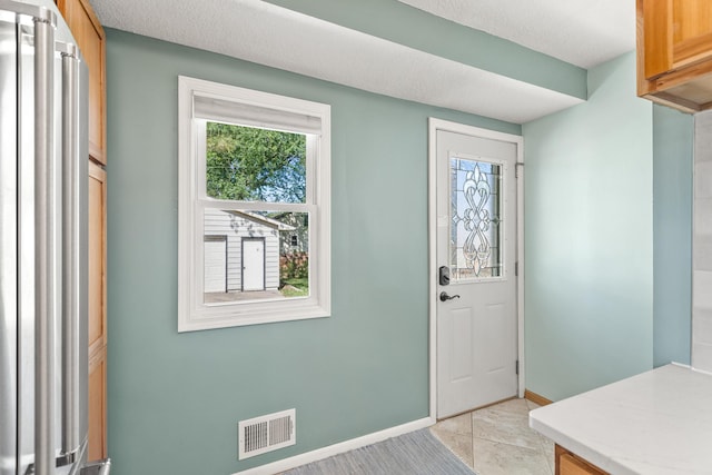 4342 Arthur St NE, Columbia Heights, MN 55421 - entrance foyer with baseboards and light tile patterned floors