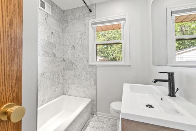 4342 Arthur St NE, Columbia Heights, MN 55421 - full bath with vanity, plenty of natural light, toilet, and shower / washtub combination