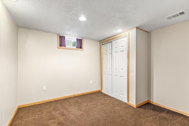 4342 Arthur St NE, Columbia Heights, MN 55421 - unfurnished bedroom featuring carpet floors, a textured ceiling, baseboards, a closet, and recessed lighting