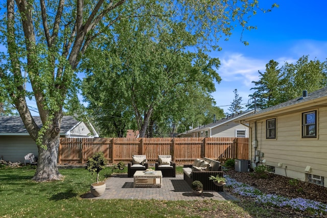 4342 Arthur St NE, Columbia Heights, MN 55421 - view of yard featuring outdoor lounge area, a patio, and cooling unit