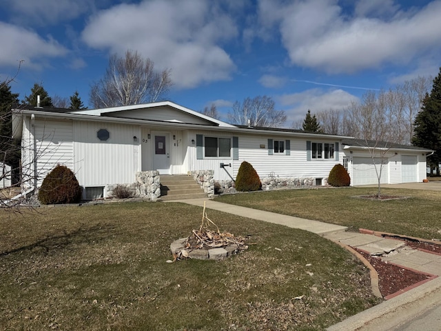 103 8th St SW, Roseau, MN 56751 - ranch-style house with a front lawn, an attached garage, and concrete driveway