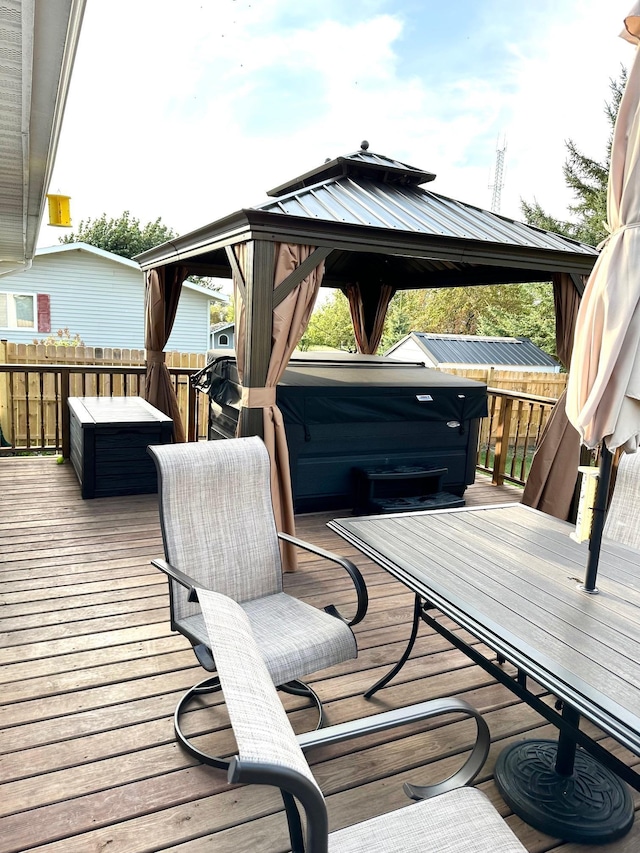 103 8th St SW, Roseau, MN 56751 - deck featuring a gazebo and a hot tub