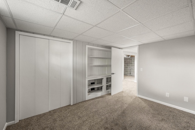 825 Elm Creek Cir, Champlin, MN 55316 - unfurnished bedroom with carpet floors, a drop ceiling, a closet, and baseboards