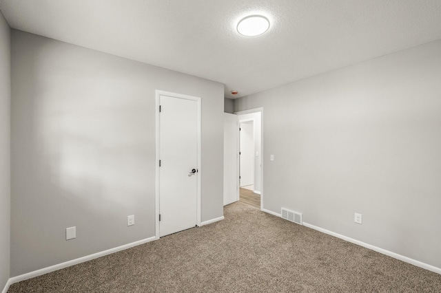 825 Elm Creek Cir, Champlin, MN 55316 - carpeted empty room with baseboards