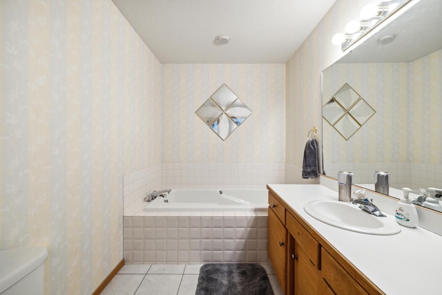2031 Rose Creek Dr S, Fargo, ND 58104 - full bath with wallpapered walls, vanity, a bath, tile patterned floors, and toilet