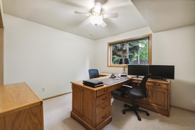 2031 Rose Creek Dr S, Fargo, ND 58104 - office area with light colored carpet, baseboards, ceiling fan, and a textured ceiling
