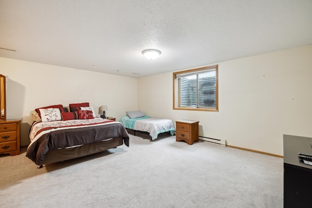 2031 Rose Creek Dr S, Fargo, ND 58104 - bedroom featuring a baseboard heating unit, carpet floors, a textured ceiling, and baseboards
