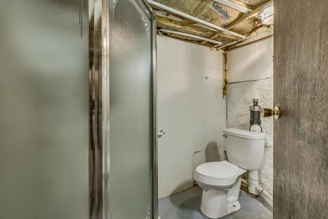 1491 Wynne Ave, Saint Paul, MN 55108 - bathroom with concrete flooring, toilet, and a stall shower