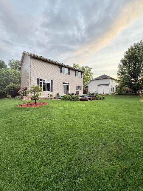 1991 Fountain Ln, Waconia, MN 55387 - back of property featuring a yard