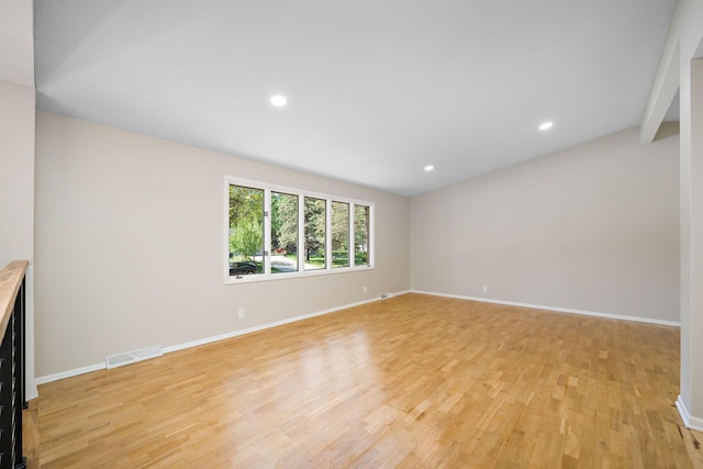 18120 27th Ave N, Plymouth, MN 55447 - spare room with light wood-style floors, baseboards, and recessed lighting