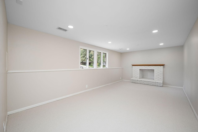 18120 27th Ave N, Plymouth, MN 55447 - unfurnished living room with baseboards, recessed lighting, carpet, and a brick fireplace