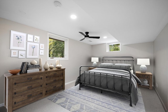 18120 27th Ave N, Plymouth, MN 55447 - bedroom with light carpet, baseboards, multiple windows, and recessed lighting