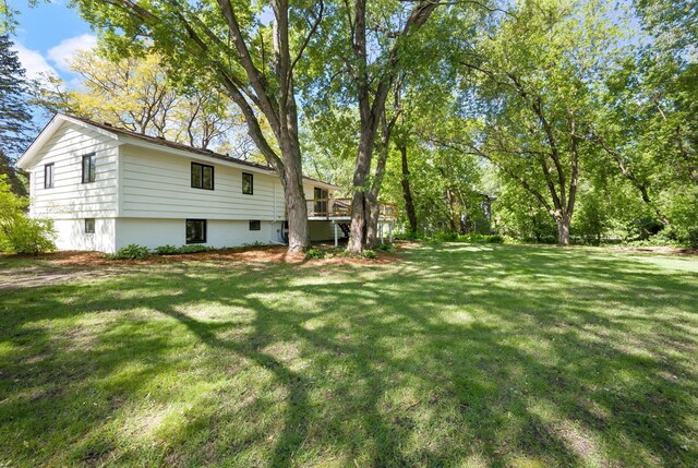 18120 27th Ave N, Plymouth, MN 55447 - view of grassy yard with a wooden deck