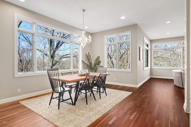 4266 Manor Court Rd, Minnetonka, MN 55345 - dining area with baseboards, dark wood-style floors, a chandelier, and recessed lighting