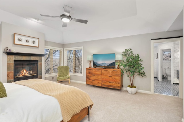 4266 Manor Court Rd, Minnetonka, MN 55345 - carpeted bedroom with a fireplace, baseboards, and multiple windows