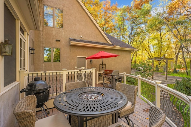 4266 Manor Court Rd, Minnetonka, MN 55345 - wooden deck featuring area for grilling and outdoor dining area