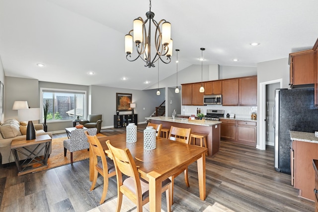 11350 97th Ave N, Maple Grove, MN 55369 - dining area featuring vaulted ceiling, stairs, dark wood finished floors, a chandelier, and recessed lighting