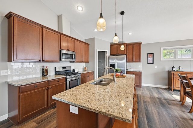 11350 97th Ave N, Maple Grove, MN 55369 - kitchen featuring stainless steel appliances, a sink, vaulted ceiling, dark wood finished floors, and decorative backsplash