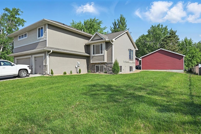 11350 97th Ave N, Maple Grove, MN 55369 - view of property exterior with a yard, stone siding, an attached garage, and driveway