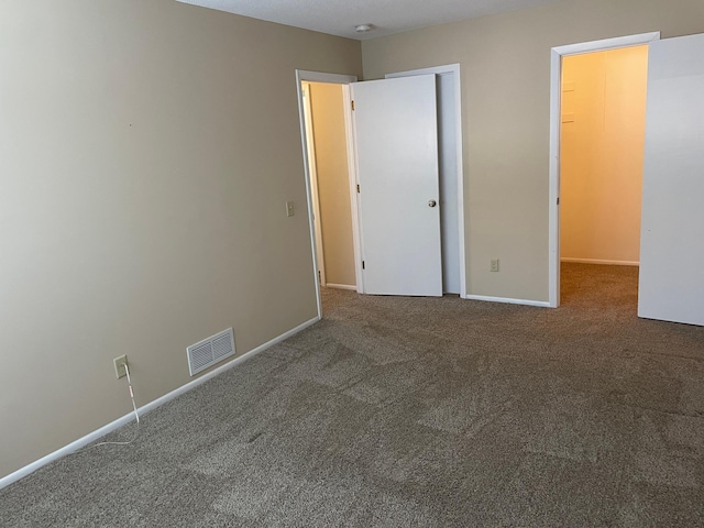 12232 Oak Leaf Cir, Burnsville, MN 55337 - unfurnished bedroom with carpet, baseboards, and a closet