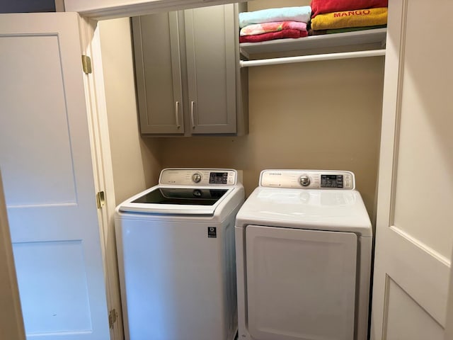 4312 France Ave S, Edina, MN 55410 - laundry area featuring cabinet space and washer and dryer