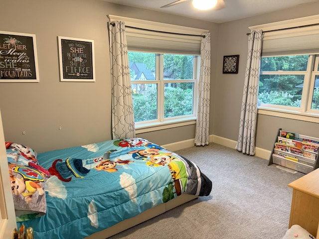 4312 France Ave S, Edina, MN 55410 - carpeted bedroom featuring baseboards and a ceiling fan