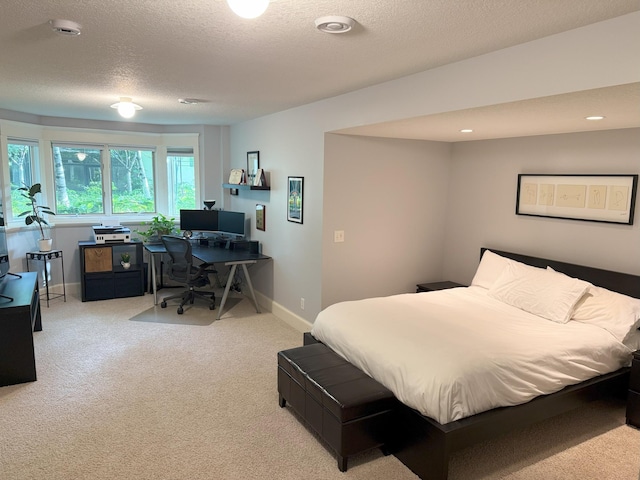 4312 France Ave S, Edina, MN 55410 - carpeted bedroom with a textured ceiling, an office area, baseboards, and recessed lighting