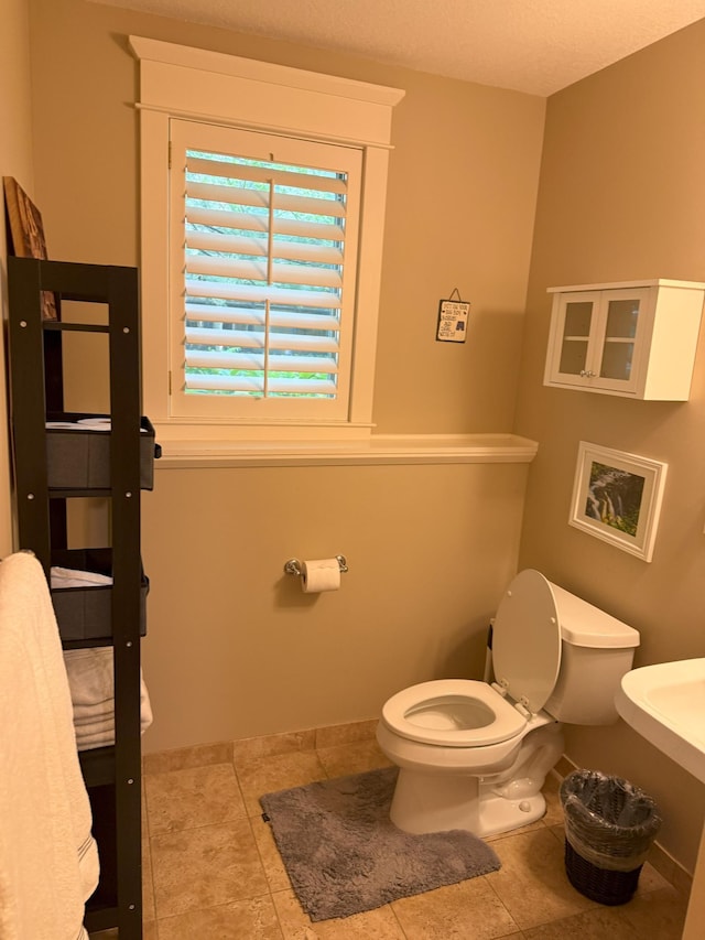 4312 France Ave S, Edina, MN 55410 - bathroom featuring toilet and tile patterned floors