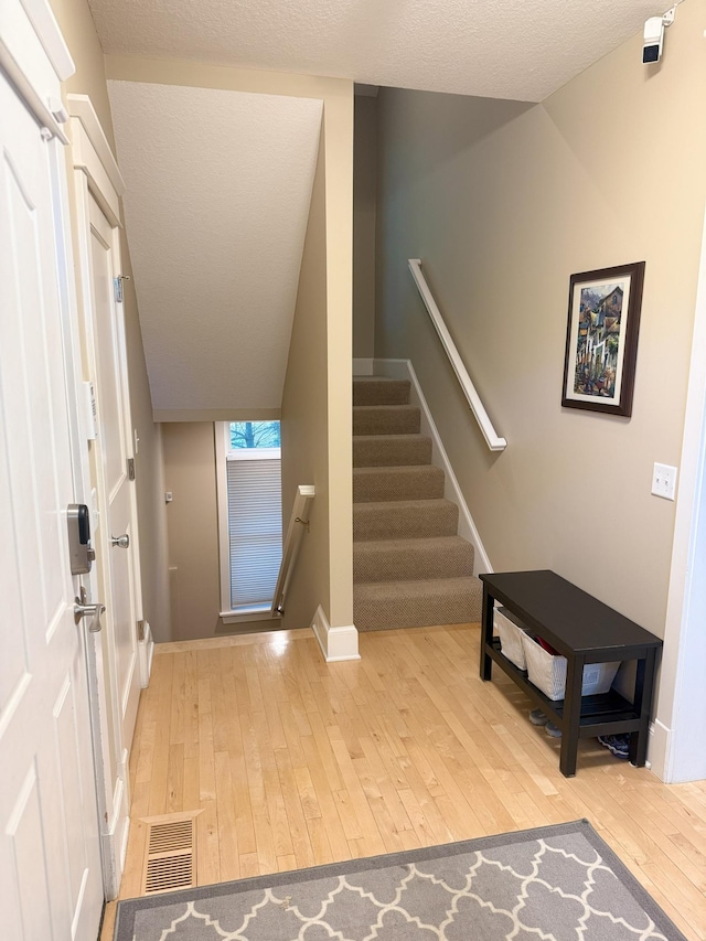 4312 France Ave S, Edina, MN 55410 - foyer entrance featuring hardwood / wood-style flooring and baseboards