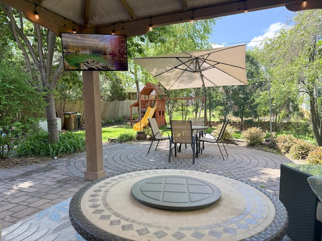 4312 France Ave S, Edina, MN 55410 - view of patio featuring a playground and outdoor dining space