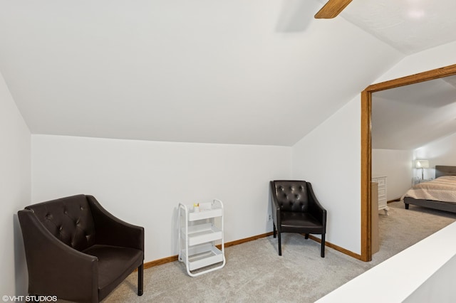 220 State St, Belle Plaine, MN 56011 - living area featuring carpet, vaulted ceiling, ceiling fan, and baseboards