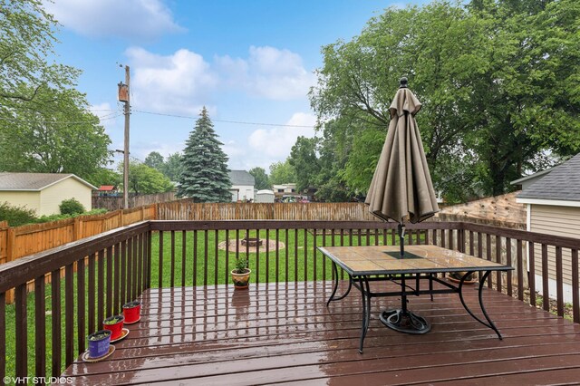 220 State St, Belle Plaine, MN 56011 - wooden deck featuring outdoor dining area