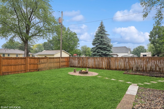220 State St, Belle Plaine, MN 56011 - view of yard featuring an outdoor fire pit