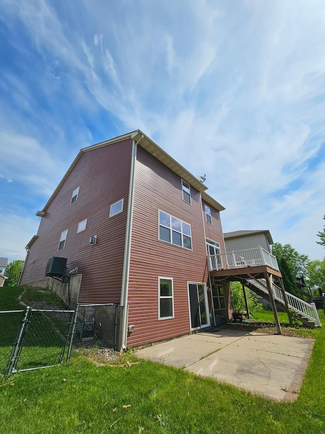 4629 Empress Way N, Hugo, MN 55038 - back of house with a patio, a wooden deck, and cooling unit