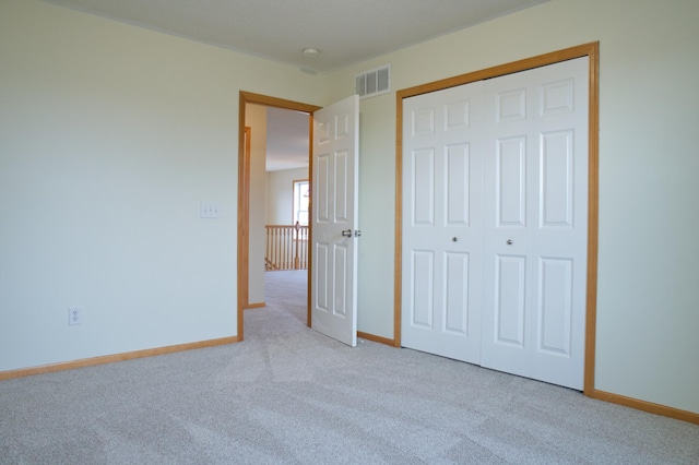 4629 Empress Way N, Hugo, MN 55038 - unfurnished bedroom with carpet flooring, baseboards, and a closet