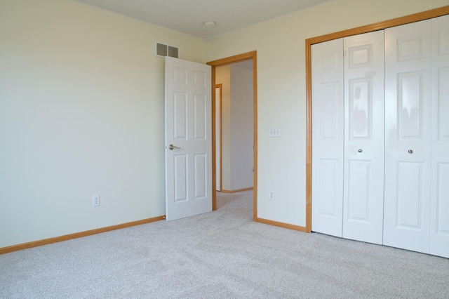 4629 Empress Way N, Hugo, MN 55038 - unfurnished bedroom with carpet flooring, baseboards, and a closet