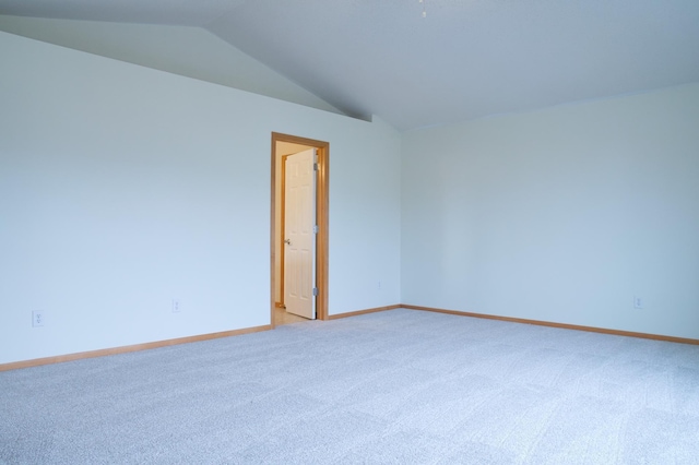 4629 Empress Way N, Hugo, MN 55038 - unfurnished room with lofted ceiling, light colored carpet, and baseboards