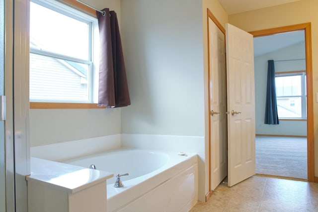 4629 Empress Way N, Hugo, MN 55038 - bathroom featuring a garden tub and tile patterned floors