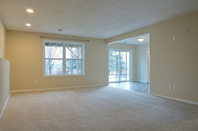 4629 Empress Way N, Hugo, MN 55038 - spare room with carpet floors, recessed lighting, and baseboards