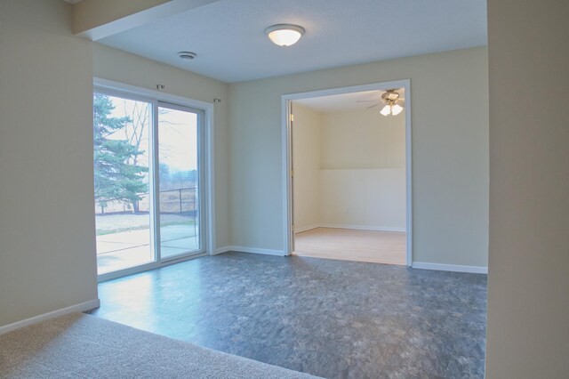 4629 Empress Way N, Hugo, MN 55038 - spare room featuring ceiling fan, baseboards, and a smoke detector