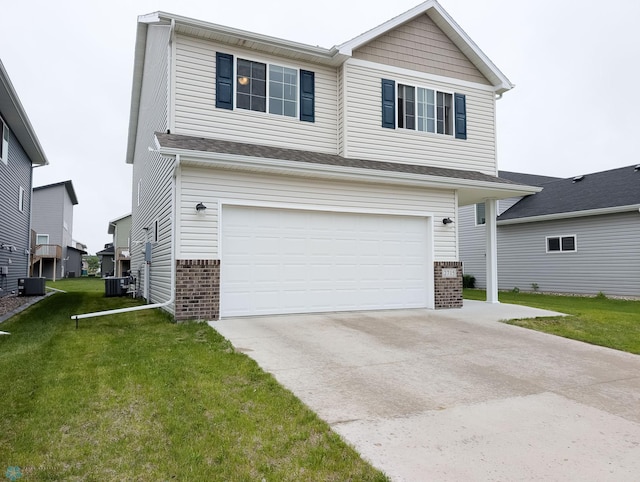 2715 11th St W, West Fargo, ND 58078 - view of front of home with brick siding, an attached garage, concrete driveway, and a front lawn