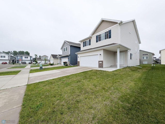 2715 11th St W, West Fargo, ND 58078 - view of front of house featuring an attached garage, driveway, a front lawn, and a residential view