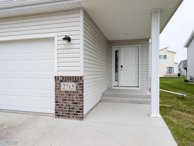2715 11th St W, West Fargo, ND 58078 - view of exterior entry featuring a yard