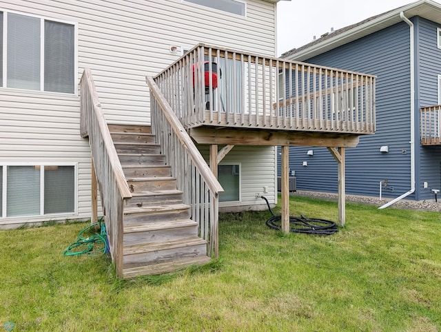 2715 11th St W, West Fargo, ND 58078 - rear view of property featuring stairs, a deck, and a yard