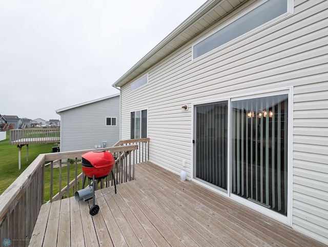 2715 11th St W, West Fargo, ND 58078 - wooden deck with a yard