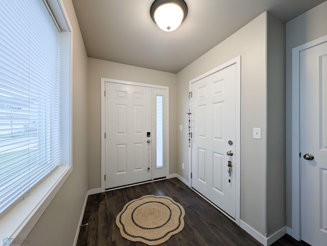 2715 11th St W, West Fargo, ND 58078 - foyer entrance with dark wood-type flooring and baseboards