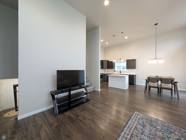 2715 11th St W, West Fargo, ND 58078 - living area with dark wood-style floors, recessed lighting, and a chandelier