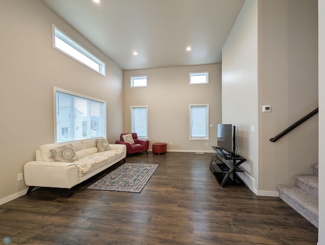 2715 11th St W, West Fargo, ND 58078 - living room featuring stairway, dark wood finished floors, recessed lighting, and a towering ceiling