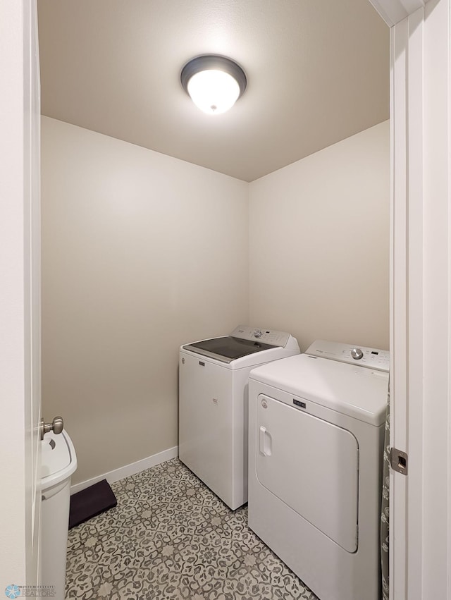 2715 11th St W, West Fargo, ND 58078 - laundry area with independent washer and dryer and light floors
